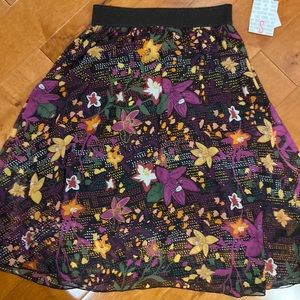 Brand new with tags Lularoe skirt size small. Style Lola